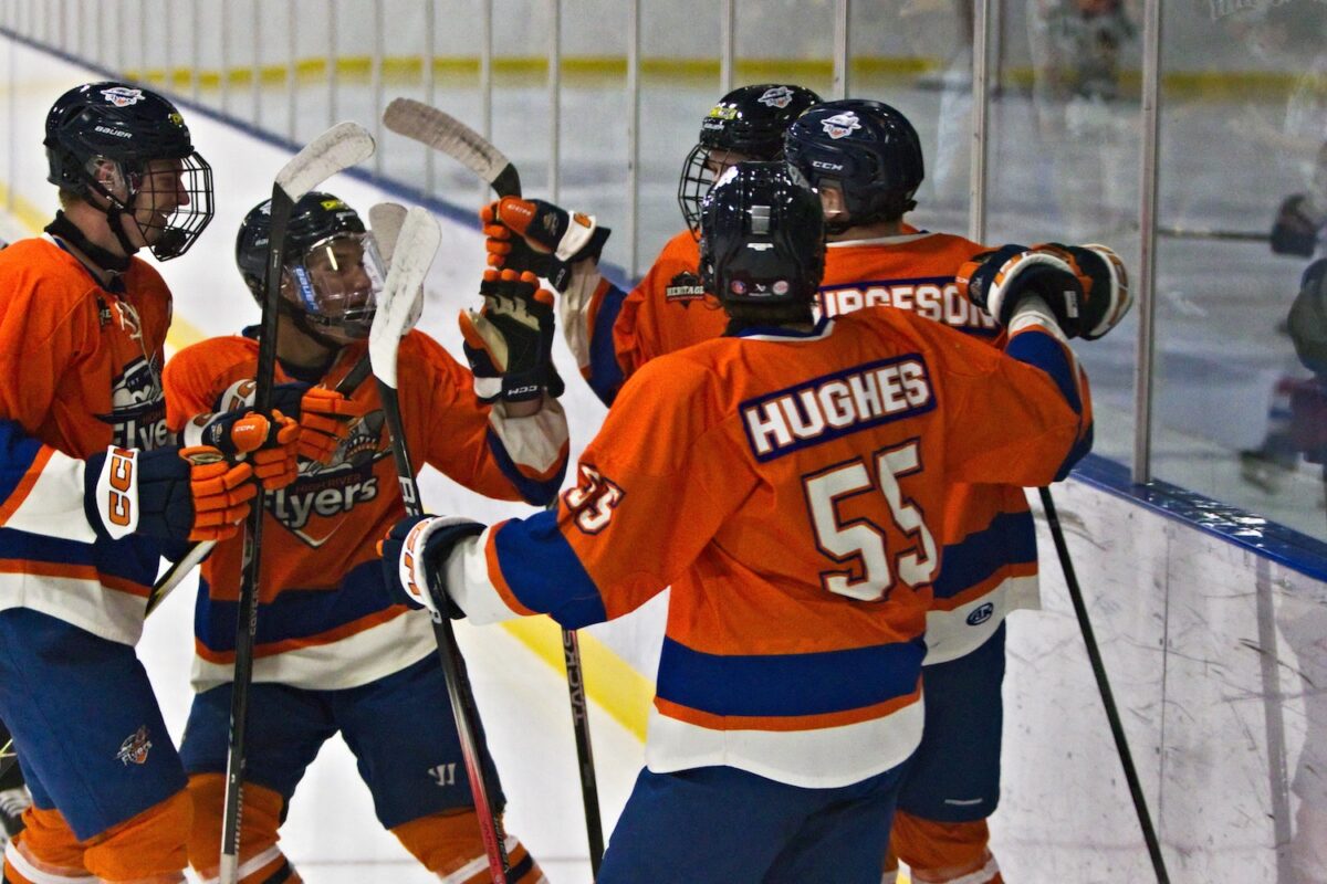 Flyers celebrate after finding the back of the net against the Colts. (Scott Savard/High River Flyers)