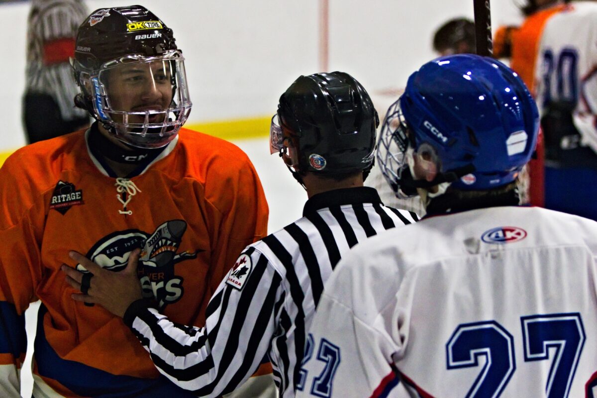 Isaac Cayetano exchanging words with a Mountainview Colt. (Scott Savard/ High River Flyers)