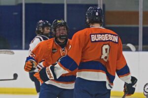Lucas Hughes full of emotion with Ethan Burgeson after the Flyers find the back of the net against the Okotoks Bisons. (Scott Savard/High River Flyers)