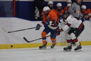 Flyers captain Wout Rehorst carrying the puck into the opposing zone. (Scott Savard/High River Flyers)