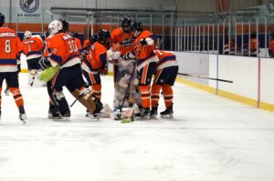 The Flyers collecting plushies after Isaac Cayetano's opening goal during the annual Teddy Bear Toss. (Submitted photo)