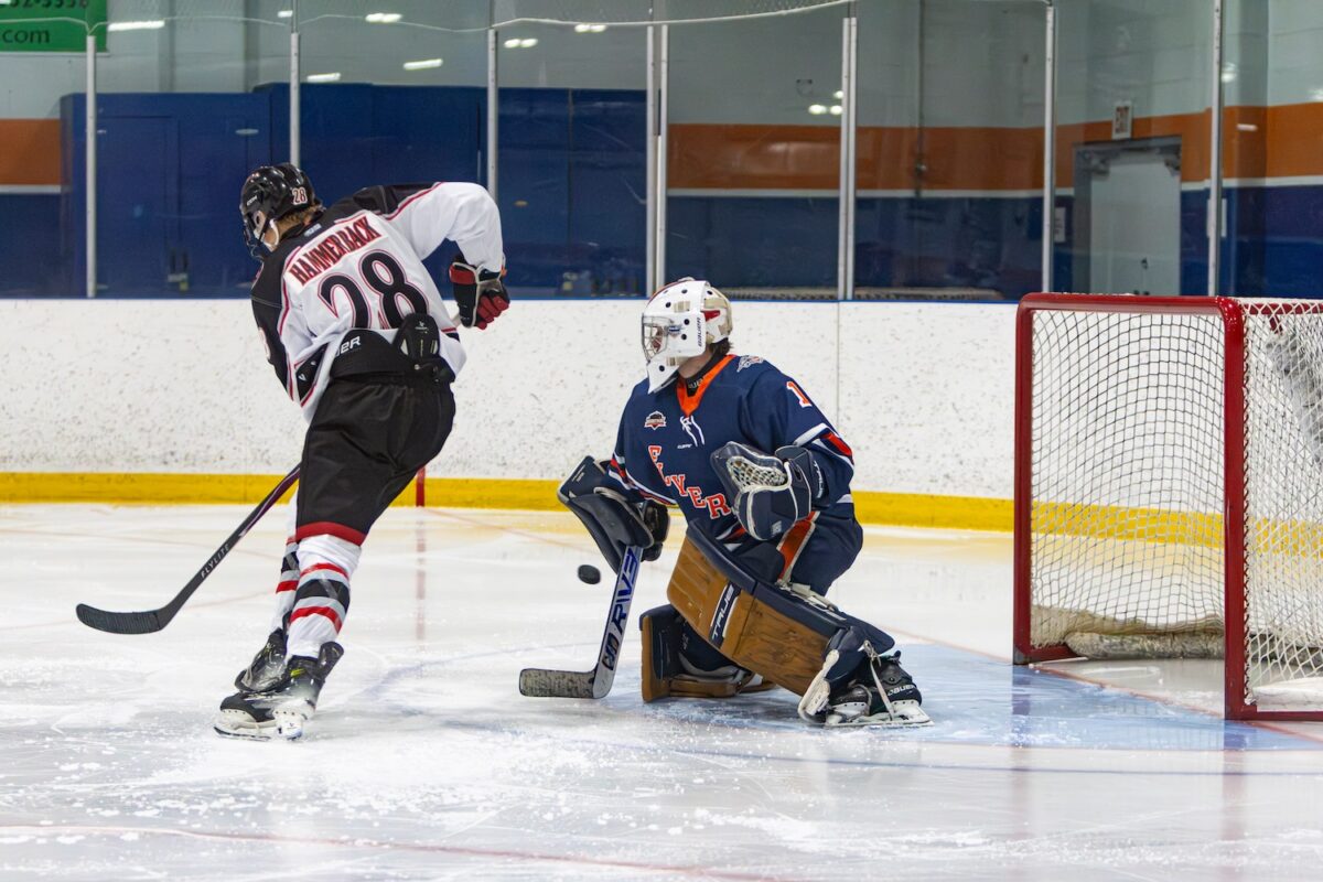 Erich Baxter with a blocker save. (Scott Savard/High River Flyers)